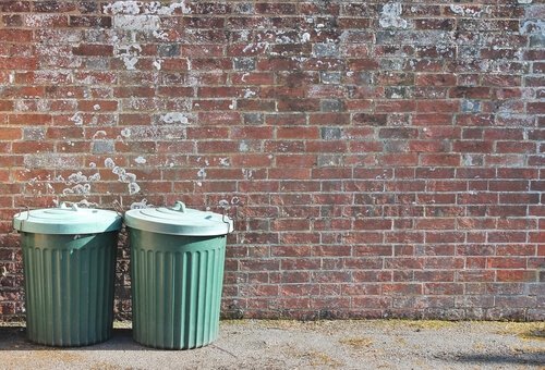 De metafoor van de vuilnisbak