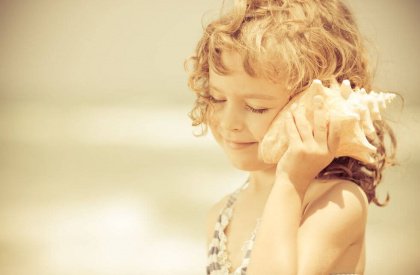 Kind met Schelp