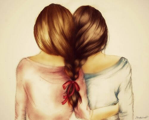 Twee meisjes wiens haar in elkaar gevlochten is want liefde is samen willen zijn