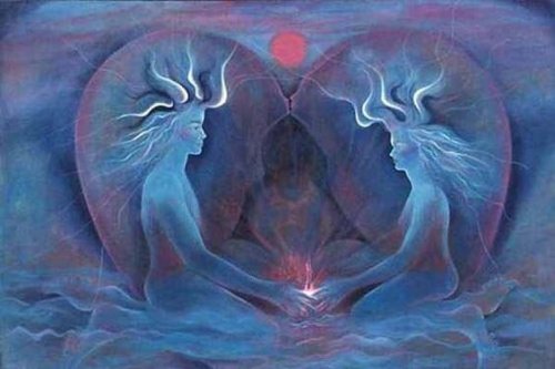 Man en een vrouw de elkaar voor een hart vasthouden als symbool voor volwassen liefde