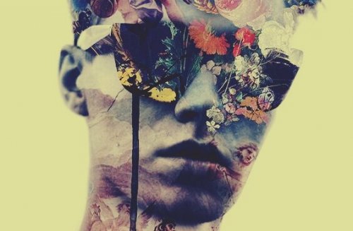 Man met een zonnebril op wiens gezicht helemaal bedekt is met bloemen want hij heeft geen intimiderende persoonlijkheid