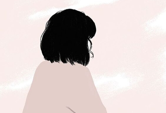 Meisje dat met voor zich uit kijkt en nadenkt