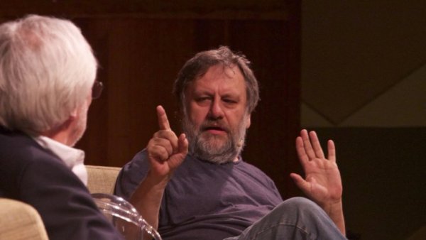 Gesprek tussen een man en Slavoj Žižek waarin er veel citaten van Slavoj Žižek worden uitgesproken