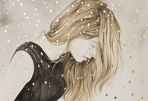 Blond meisje dat in de sneeuw staat