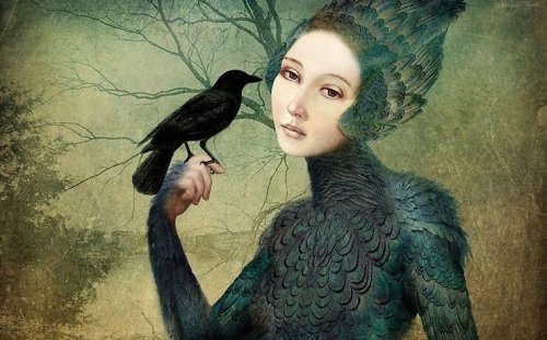 Vrouw houdt kraai vast als symbool voor passief-agressief gedrag