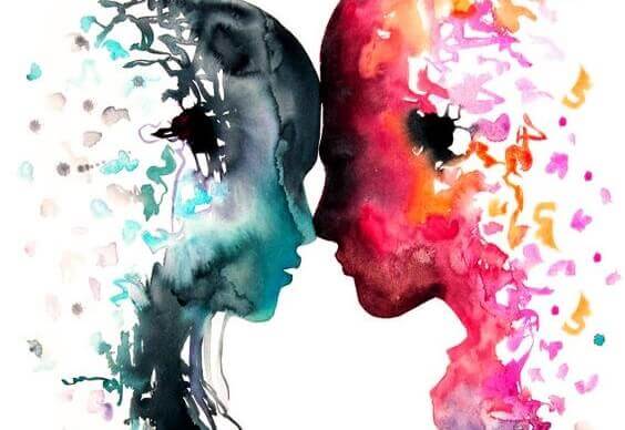 Twee mensen die hun hoofd tegen elkaar houden en hun ziel delen
