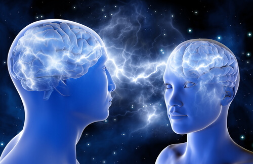 Twee mensen die via hun hersenen met elkaar in verbinding staan