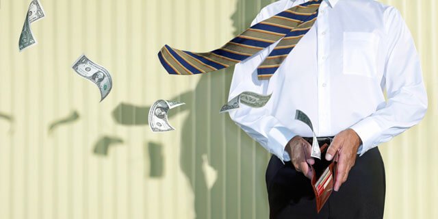 Geld en emoties: geld vliegt een portemonnee uit