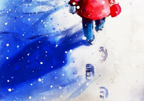 Kindje dat door de sneeuw loopt