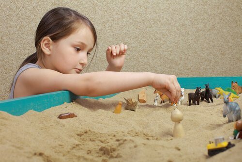 Zandbaktechniek met een kind