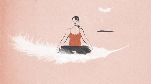 Meisje mediteert op veer