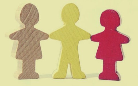 Drie poppetjes op een rij