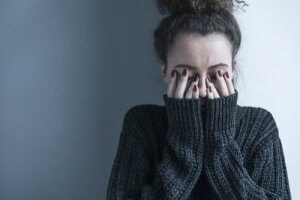 De positieve en negatieve symptomen van schizofrenie
