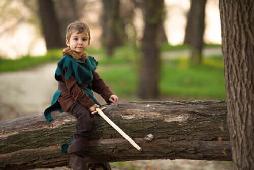 Een jongetje verkleed als Robin Hood