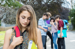 Hoe tieners te helpen omgaan met sociale druk